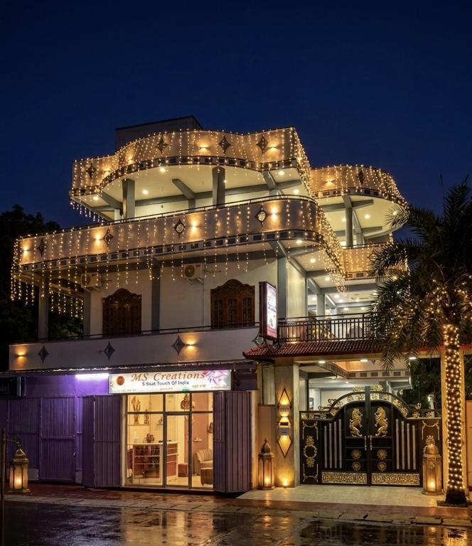 a building with lights on top of it at night at MSGuest House in Jaffna