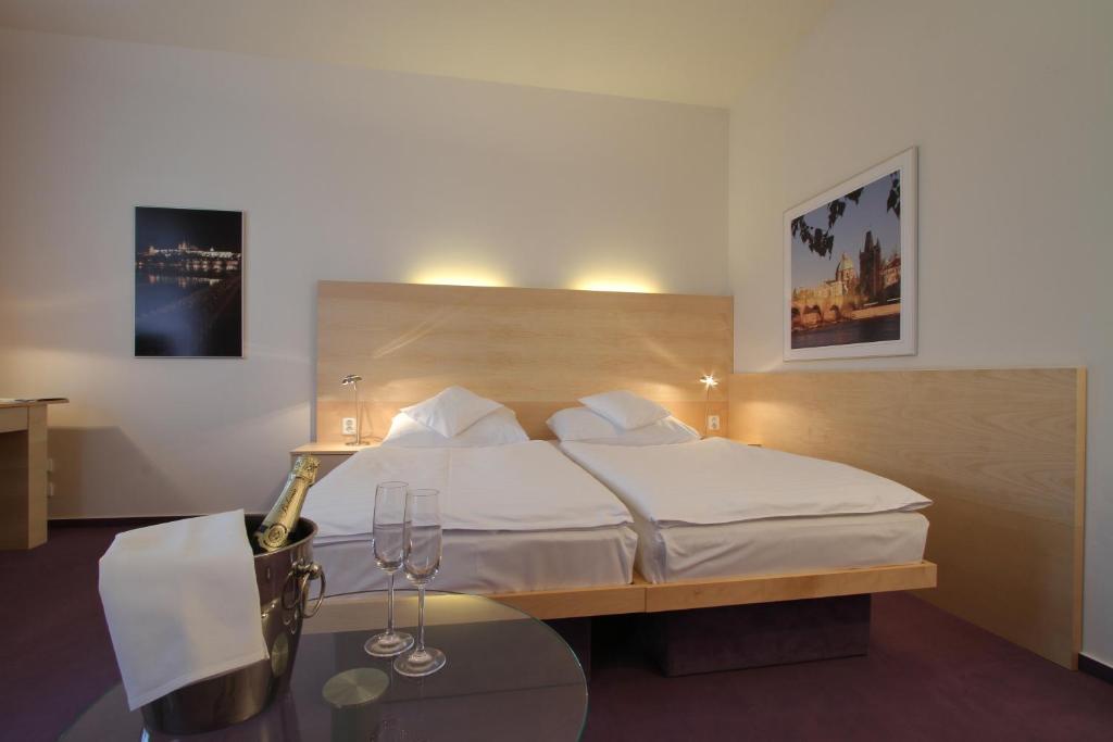 Een bed of bedden in een kamer bij Hotel DAP