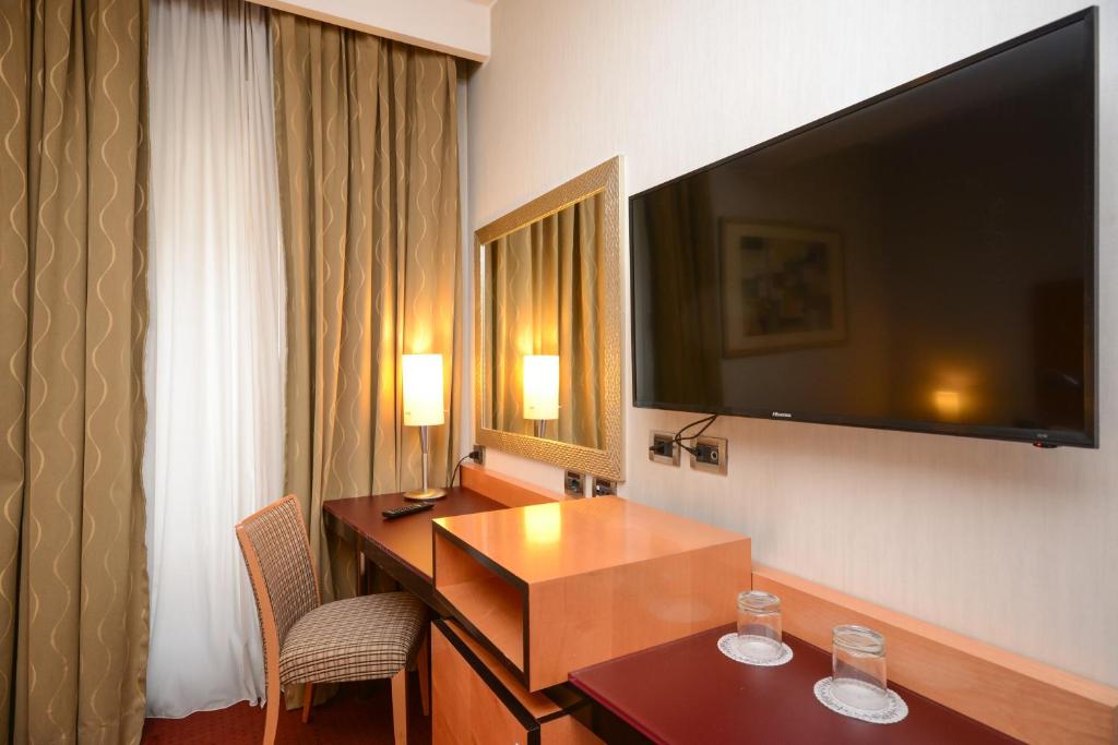 TV a/nebo společenská místnost v ubytování Hotel Igea