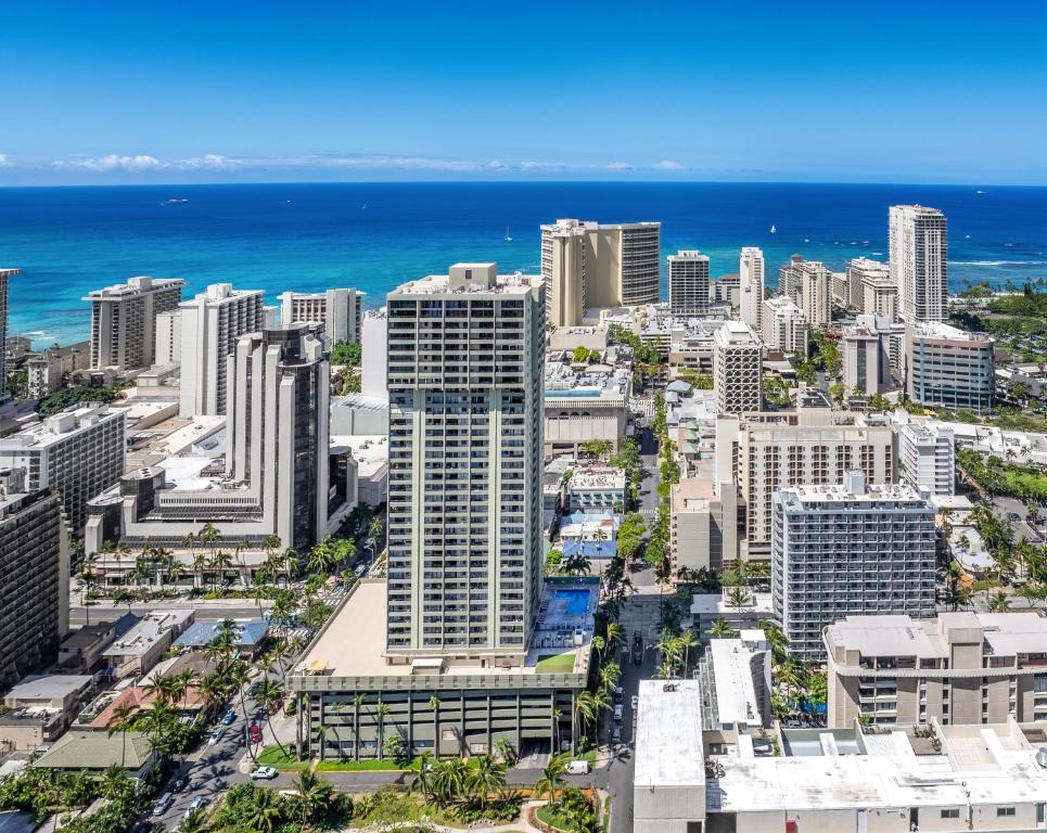 an aerial view of a city with the ocean at Royal Kuhio Resort in Honolulu
