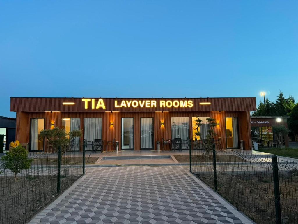 a tia lawyer rooms building with at TIA Layover Rooms in Krujë
