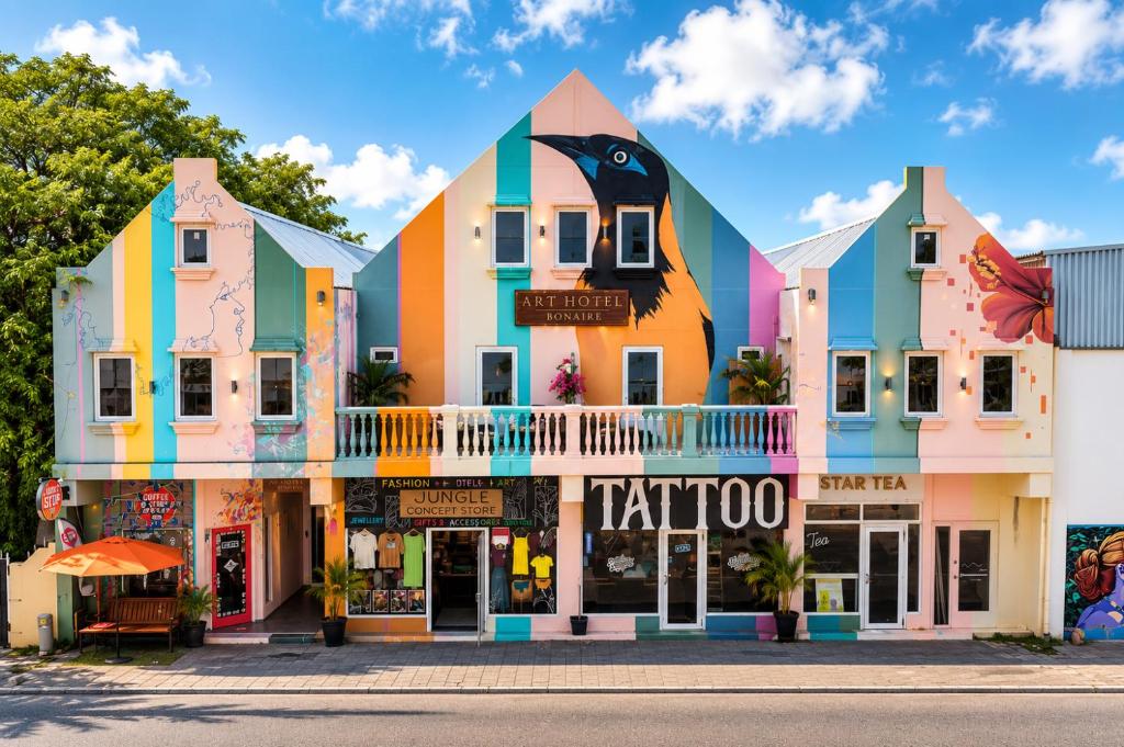 a colorful building on the side of a street at Art Hotel in Kralendijk