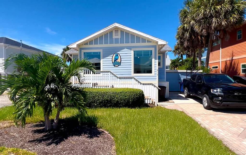 a truck parked in front of a house at 213 Ohio in Fort Myers Beach
