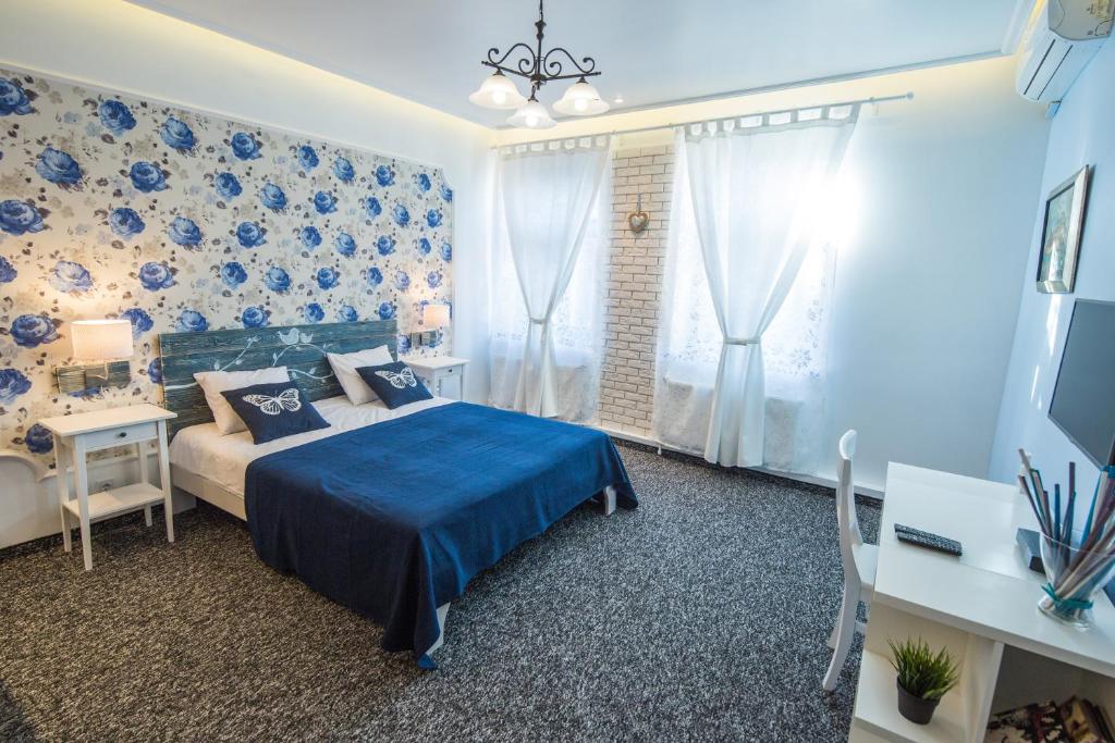 Ліжко або ліжка в номері Central Hotel