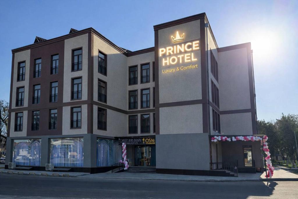 a hotel with a sign that reads prince hotel at Prince hotel in Tashkent
