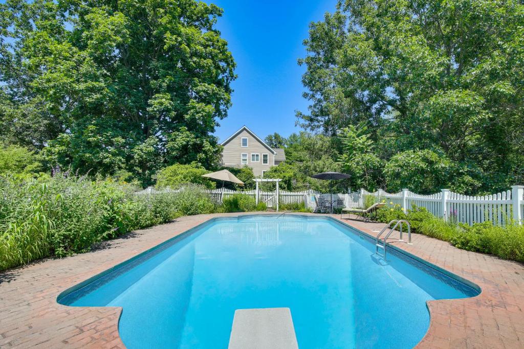a swimming pool in the backyard of a house at Heated Pool, 6 Acres: Beacon Area Vacation Rental in Lagrangeville