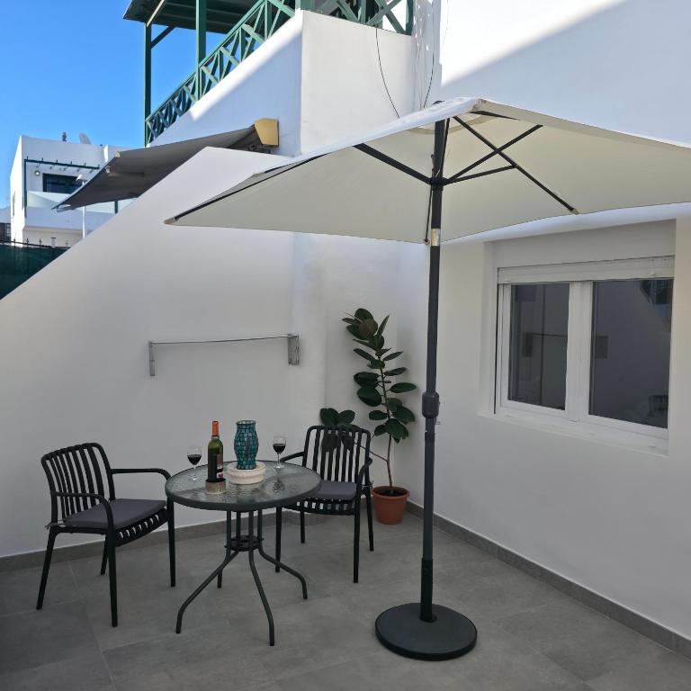 Modern Studio with Sunny Terrace - Steps from the Beach