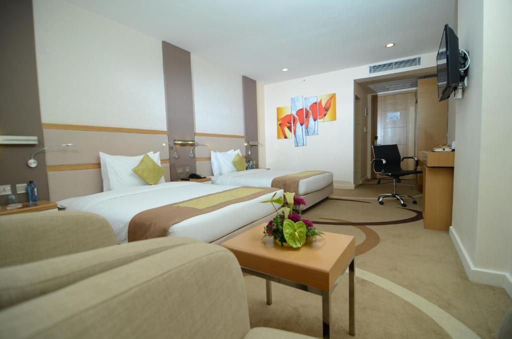 Postel nebo postele na pokoji v ubytování PrideInn Azure Hotel Nairobi Westlands