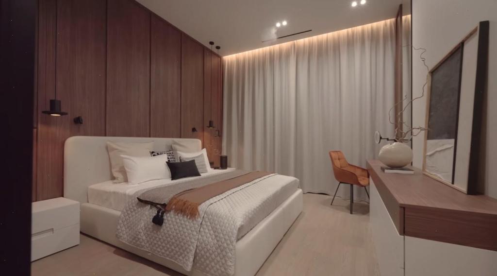 a bedroom with a bed and a desk and a television at La Dolce Sosta in Venice