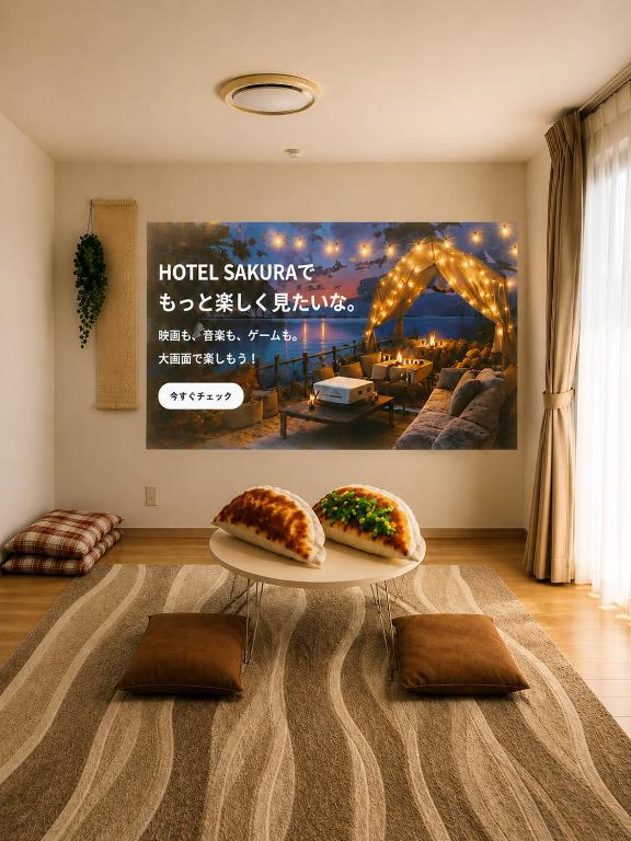 two donuts sitting on a table in a living room at Hotel Sakura 宇都宮 in Utsunomiya