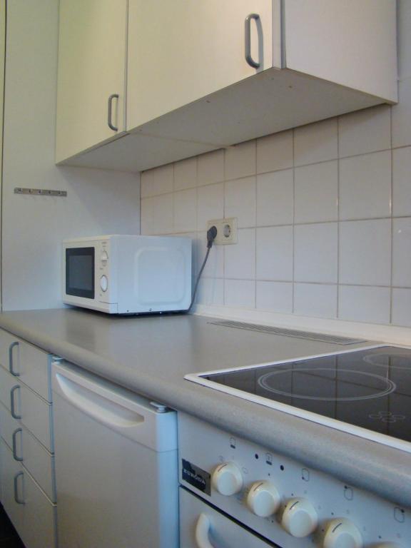 Kuchyň nebo kuchyňský kout v ubytování Rooms & Apartments near Zoologischer Garten