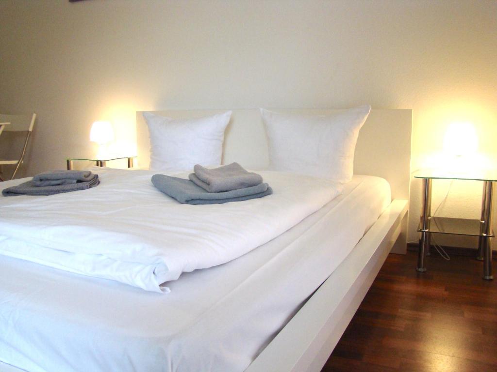 Postel nebo postele na pokoji v ubytování Rooms & Apartments near Zoologischer Garten