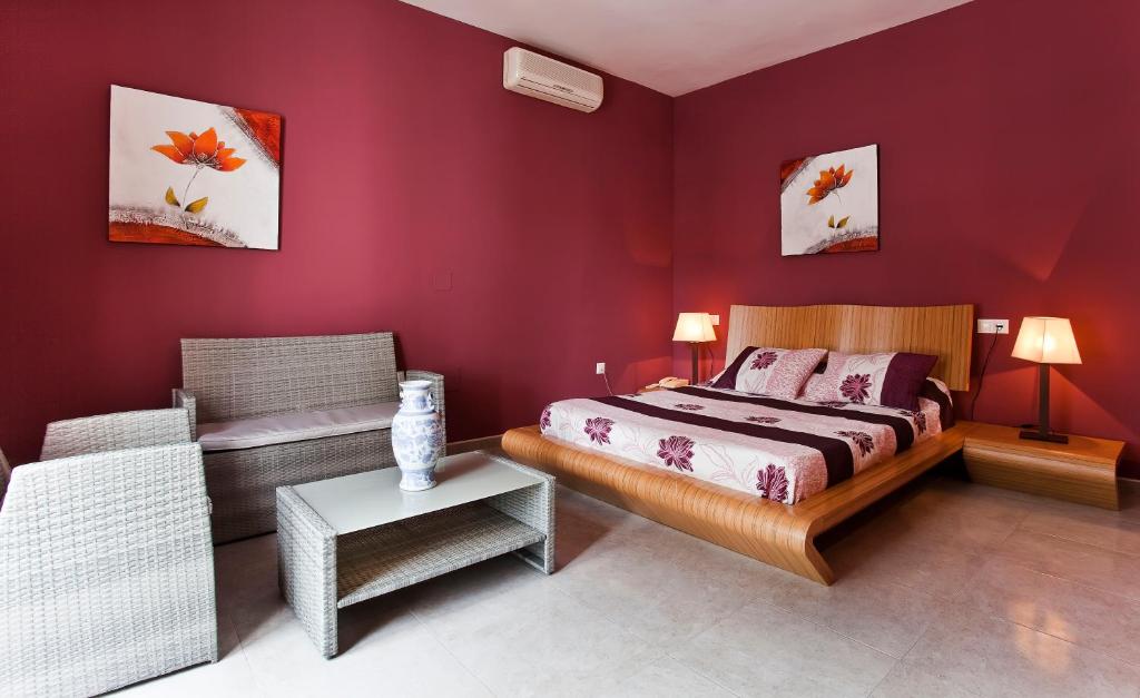 Postel nebo postele na pokoji v ubytování Hotel Atalaya