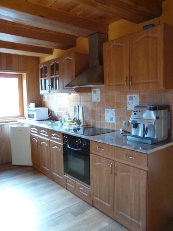 Kuchyň nebo kuchyňský kout v ubytování Tölgyfakuckó apartman