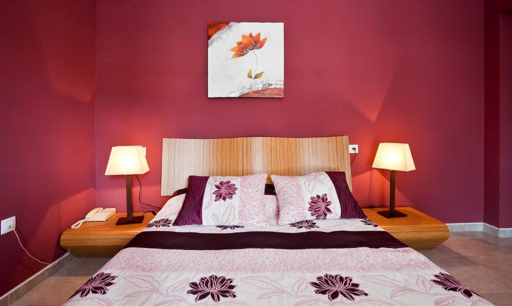 Postel nebo postele na pokoji v ubytování Hotel Atalaya