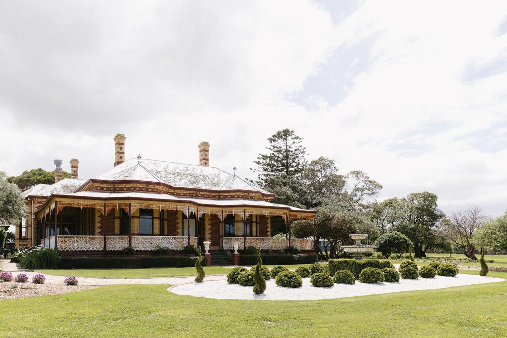 a house in a park with a garden at Suma Park Estate in Point Lonsdale