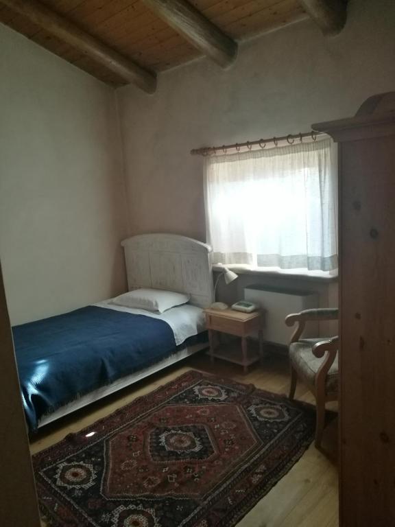 Postel nebo postele na pokoji v ubytování Costa degli Ulivi