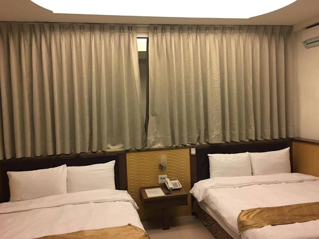 Ri Yue Hu Pan Resort - Deluxe Vierbettzimmer