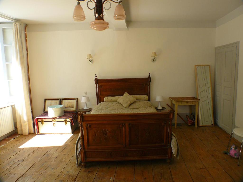 Postel nebo postele na pokoji v ubytování Nidélice Chambre d'hôtes
