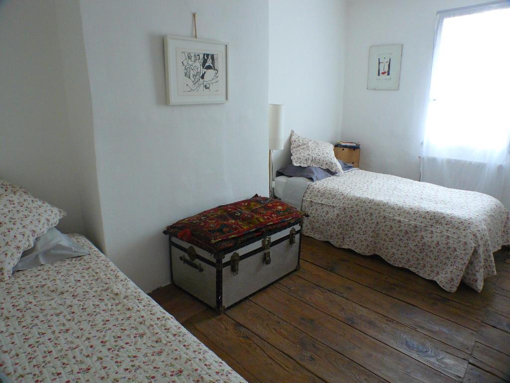 Postel nebo postele na pokoji v ubytování Nidélice Chambre d'hôtes