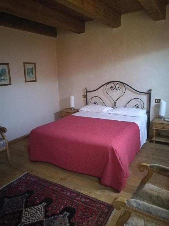 Postel nebo postele na pokoji v ubytování Costa degli Ulivi