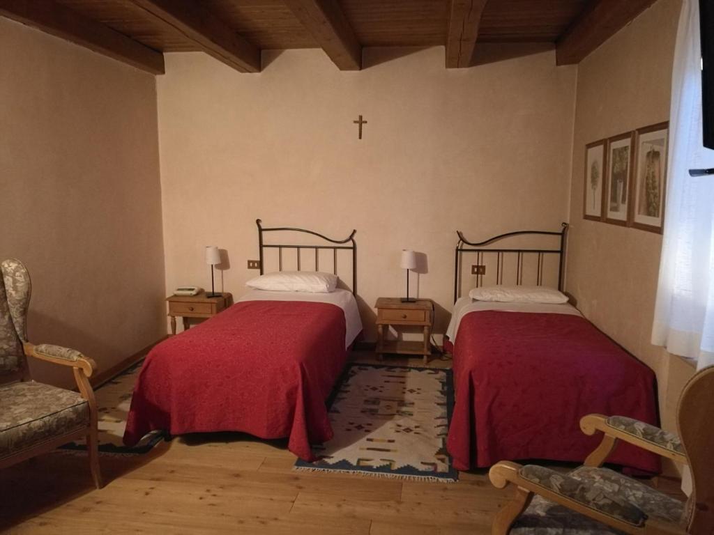Postel nebo postele na pokoji v ubytování Costa degli Ulivi