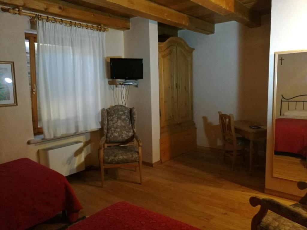 TV a/nebo společenská místnost v ubytování Costa degli Ulivi