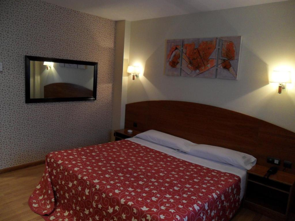 Posteľ alebo postele v izbe v ubytovaní Motel Emporio