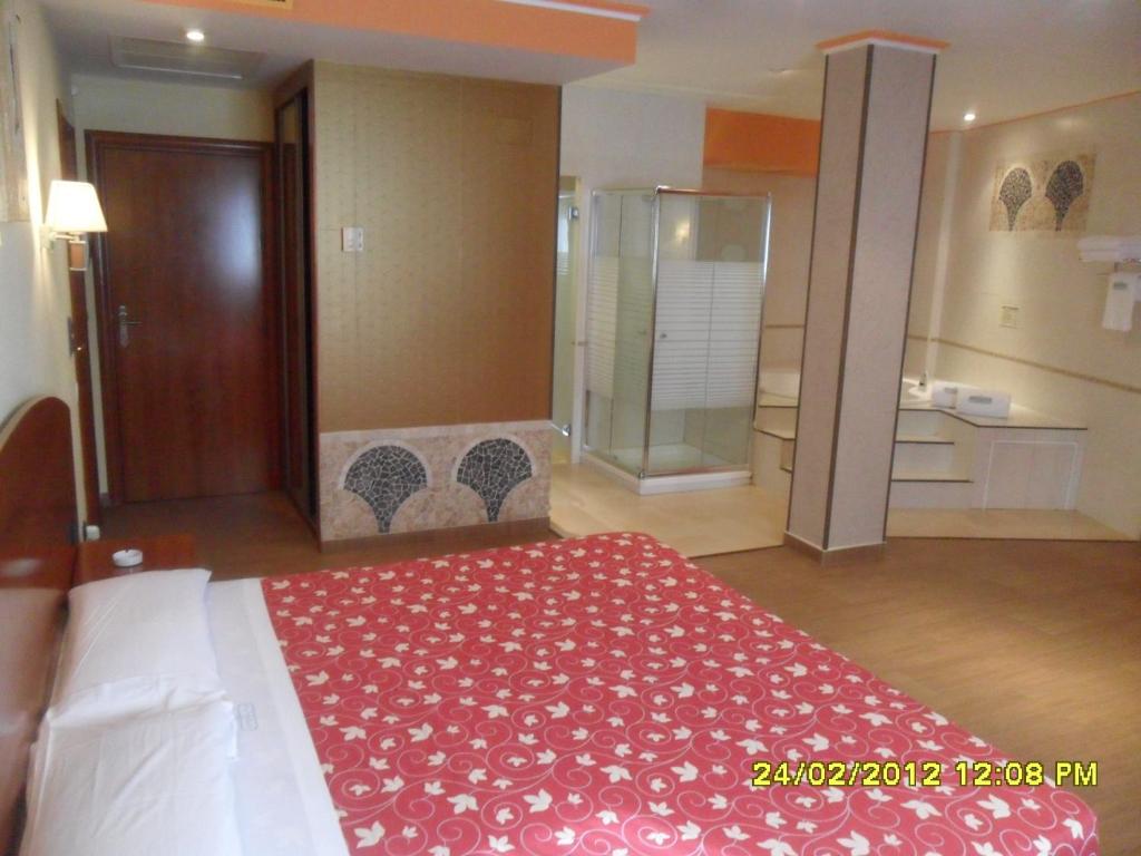 Posteľ alebo postele v izbe v ubytovaní Motel Emporio