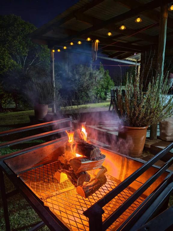 a barbecue grill with some food on top of it at Sielerus by Horeb Clarens in Clarens