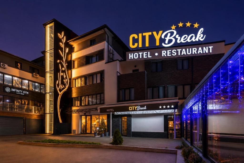 a hotel with a sign on the front of it at Hotel City Break in Galaţi