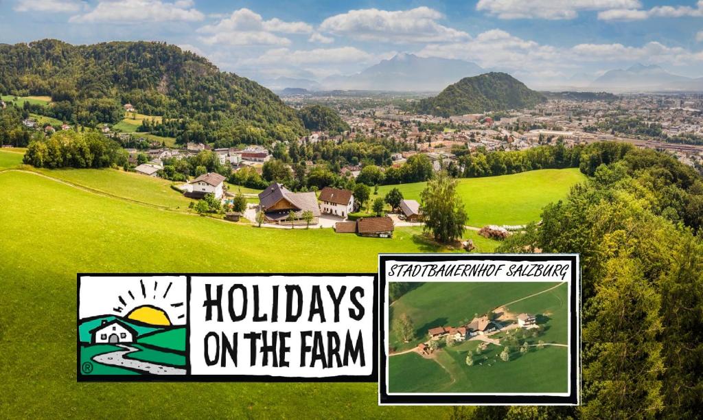 two signs that say holidays on the farm at Stadtbauernhof Salzburg - Ferienwohnung - Gut Unterleithen - farm & the city in Salzburg