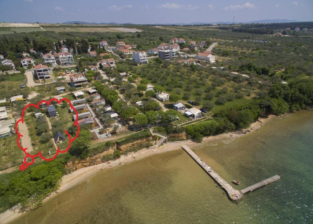 an aerial view of an island in the water at Bungalov B in Sveti Filip i Jakov