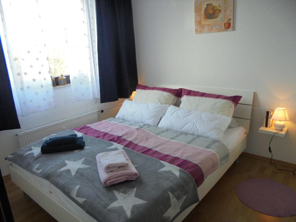 Postel nebo postele na pokoji v ubytování Ostseestern