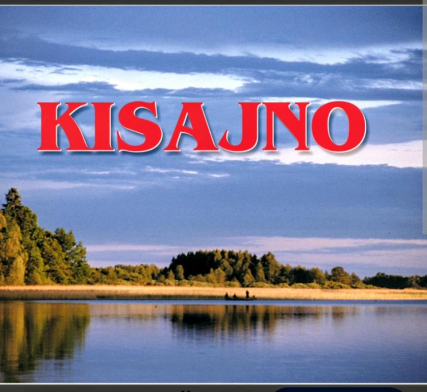 a sign that says kismaoko in the middle of a lake at Domek letniskowy 36 in Giżycko