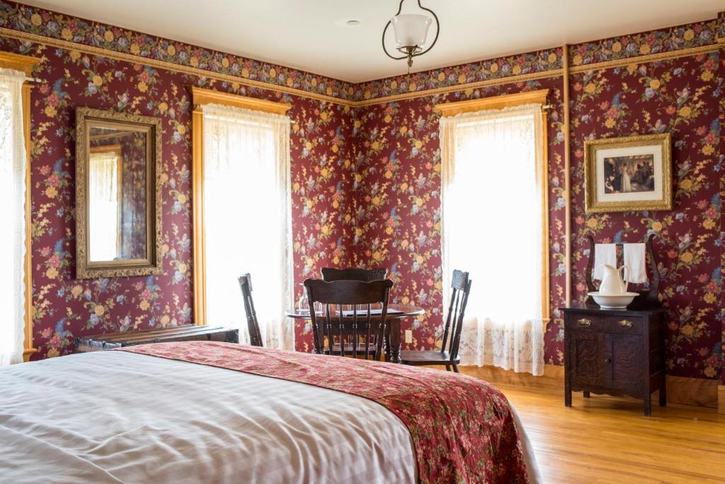 Postel nebo postele na pokoji v ubytování Hôtel Château Albert
