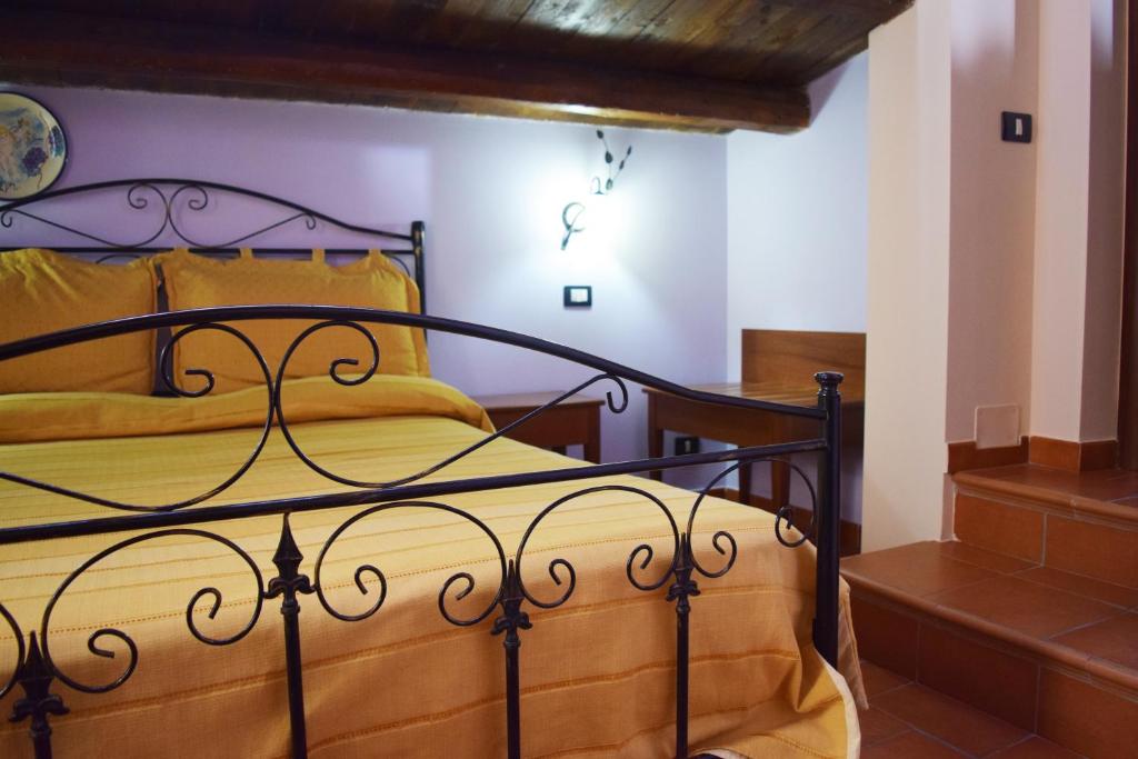 Uma cama ou camas num quarto em B&B Salotto Di Athena