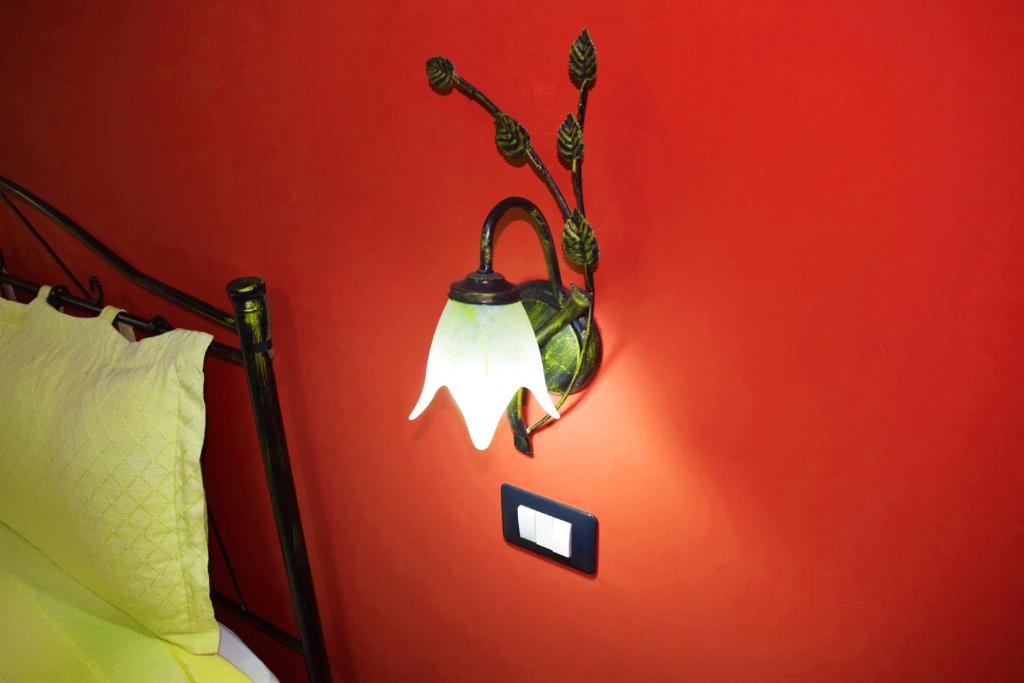Uma cama ou camas num quarto em B&B Salotto Di Athena