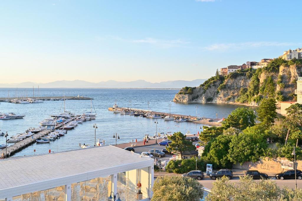 a view of a harbor with boats in the water at Agropoli Palace in Agropoli