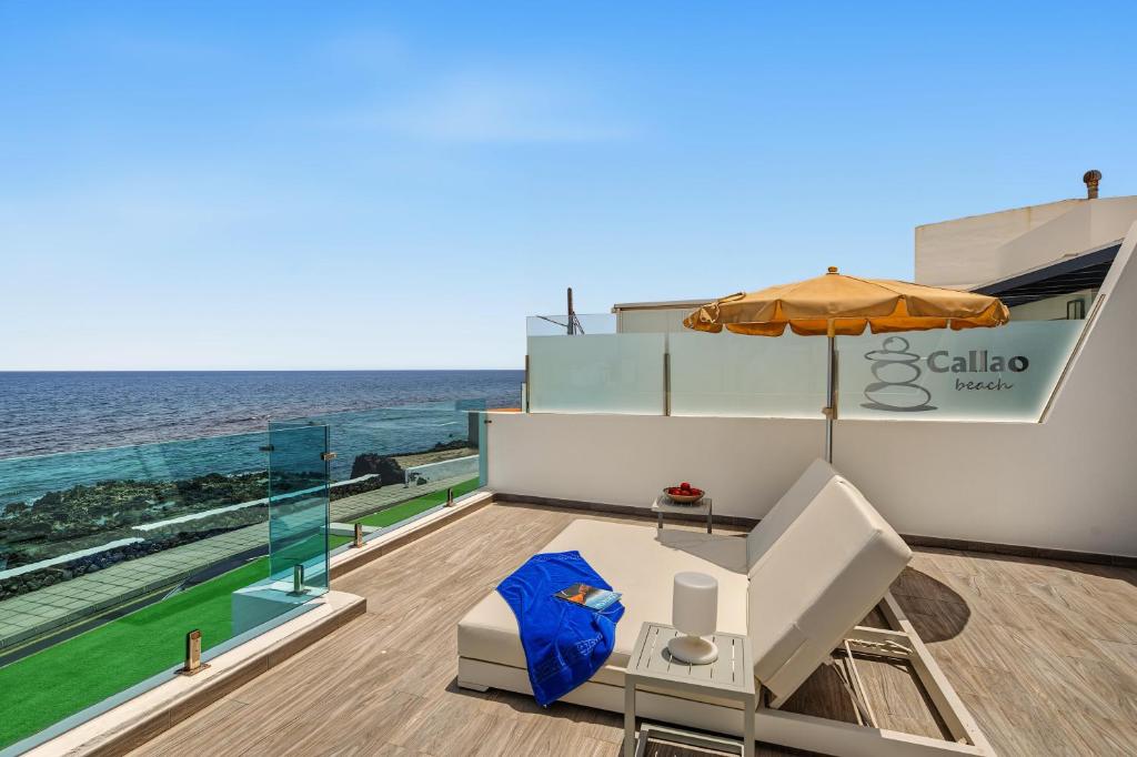 a house with a view of the ocean at Callao Beach 7 in Arrieta