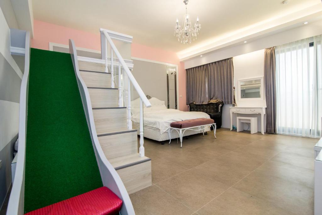 Postel nebo postele na pokoji v ubytování Ai Lian Shan Shui Homestay