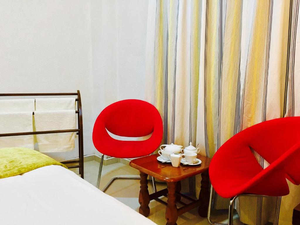 Postel nebo postele na pokoji v ubytování Hotel Dorset