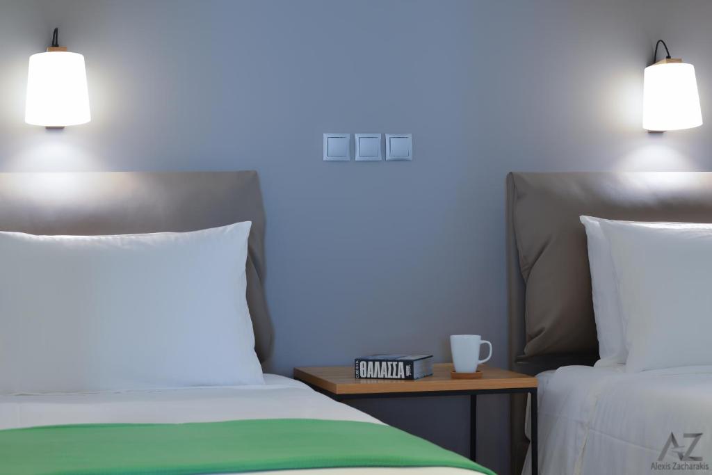 Posteľ alebo postele v izbe v ubytovaní Phaedra Apartment
