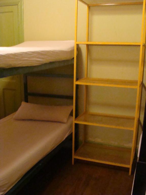 Palanda nebo palandy na pokoji v ubytování Intiaconcagua Hostel Habitaciones privadas