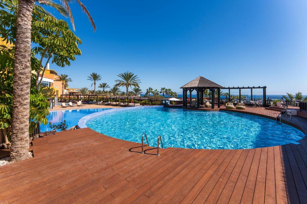 a pool at a resort with a gazebo at Occidental Jandía Royal Level - Adults Only in Morro del Jable