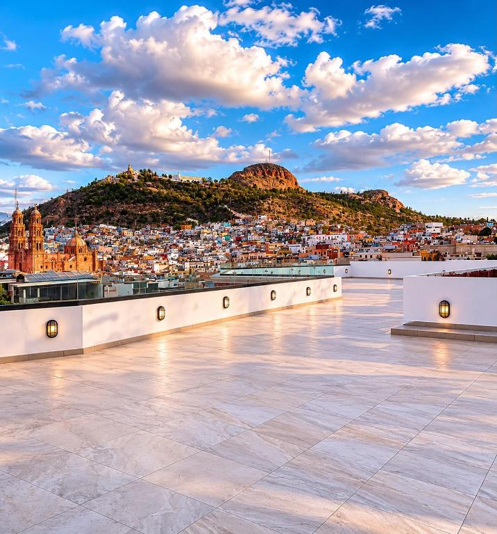 a view of a city from the roof of a building at Meson de la Merced in Zacatecas