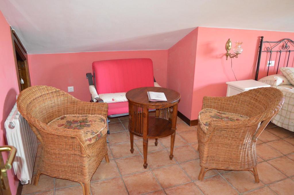 Postel nebo postele na pokoji v ubytování La Casona de Quintes