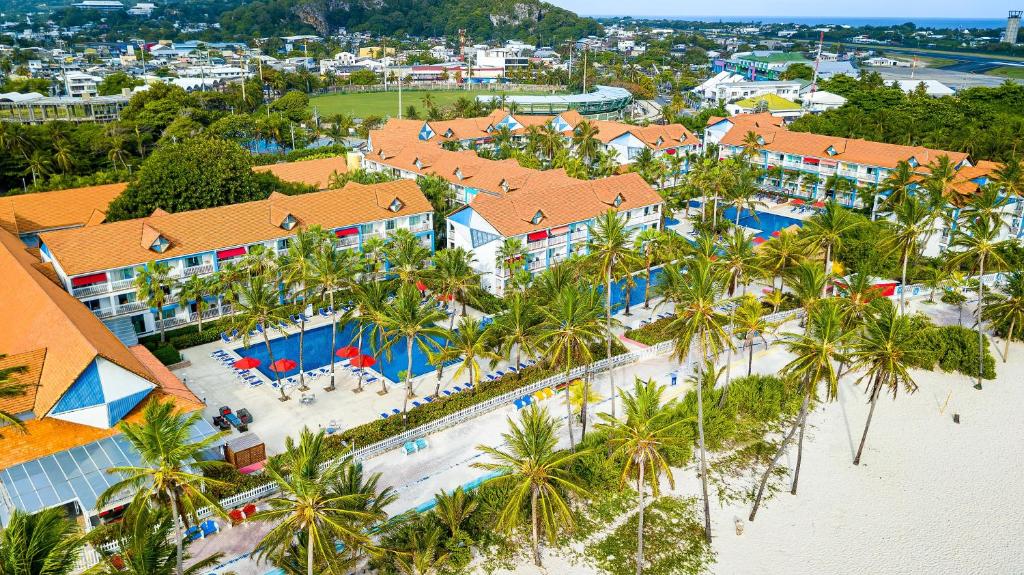 an aerial view of a resort with palm trees at Decameron Isleño - All Inclusive in San Andrés