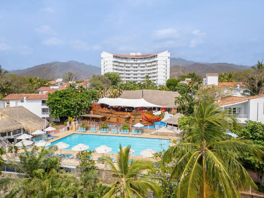 a resort with a swimming pool and a hotel at Decameron Galeon - All Inclusive in Santa Marta