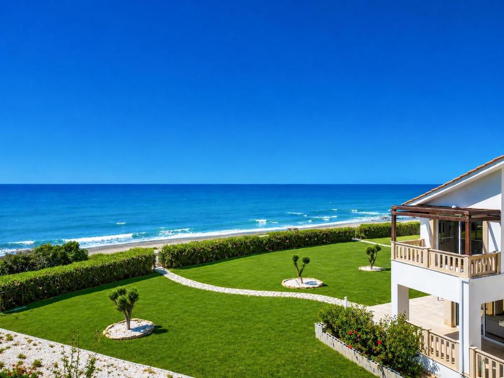 a view of the ocean from the balcony of a house at Villa Myla in Kato Yialia
